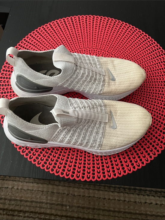 Nike Shoes - Nike Slip-On Knit Sneakers in Cream and White with Silver Swoosh